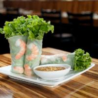 Shrimp Salad Rolls · Shrimp wrapped in rice paper and lettuce rolls with noodles, carrots, basil and beansprout. ...