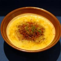 Tan Tan Men Noodle Soup · Sesame flavored soup topped with spicy ground pork.