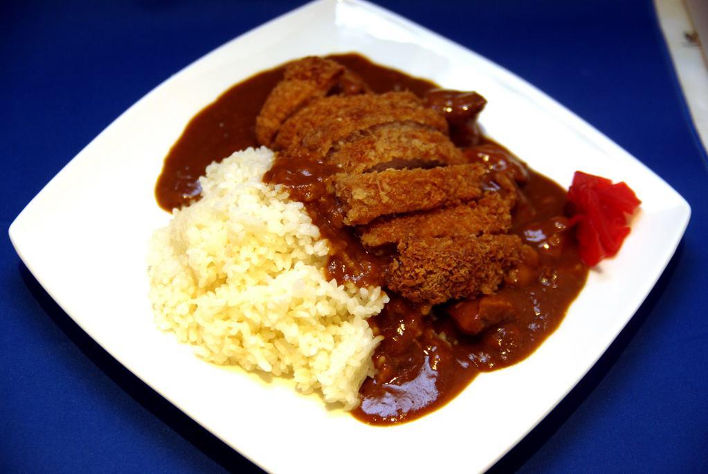 Katsu Curry Rice · Curry rice with pork or chicken cutlet.