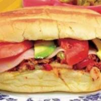 Ham Torta · Ham. Served with mayo, lettuce, tomato, avocado and refried beans