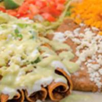 Flautas de Pollo (4) · Comes with lettuce, queso fresco, and sour cream. Served with refried beans.