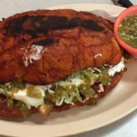 Rincon Pambazo · Mexicano bolillo bread sautéed with Guajillo salsa, your choice of meat, lettuce, queso fres...