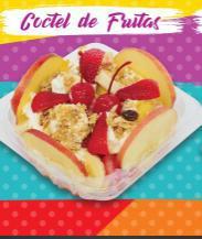 Coctel De Frutas (Fruit Cocktail) · Cantaloupe, watermelon, pineapple, papaya, banana, with whipped cream, honey, and granola.
