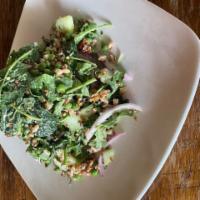 Greens & Grains Salad · Baby kale, arugula, farro, quinoa, cucumber, peas, red onions, green goddess dressing.