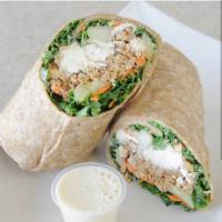 Walnut Meat Wrap · House made walnut meat, house made hummus, cucumber, carrots and feta cheese layered inside ...
