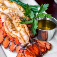 Twin Maine Lobster Tails · 2 - 4oz grilled lobster tails - drawn butter - charred lemon