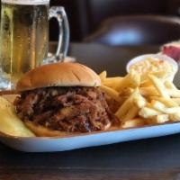 BBQ Pulled Pork Sandwich · In house slow cooked pulled pork served on a bun.