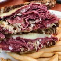 Corned Beef Sandwich · Baked in our own ovens, sliced thin and loaded on your choice of marble rye or white bread.