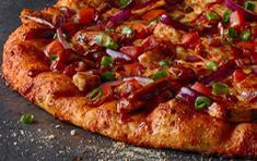 BBQ Chicken Pizza · Chicken, bacon, cheddar, tomatoes, red & green onions on BBQ ranch sauce topped with sweet &...