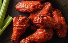 24 Classic Wings · Enjoy our Classic Wings tossed in your choice of sauce or none at all, and served with your ...