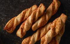 6 Garlic Parmesan Twists · Our famous Garlic Parmesan Twists. Rolled fresh daily and baked to perfection with fresh gar...