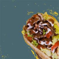 Beef  Gyro Wrap · Thinly sliced beef and lamb meat served with tomatoes, onions and lettuce on pita bread. Ser...