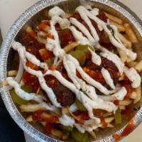 SHISHMAN FRIES · Seasoned crinkle fries with jalapeno, onions, pickles, feta cheese and white-hot sauce toget...