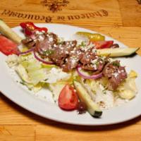 Steak Salad · Iceberg, cucumber, tomato, cherry hot peppers, pepperoncini, red & green onion, lemon oregan...