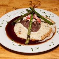 Filet Oscar Dinner · Leek mashed potatoes, asparagus, Cabernet reduction, snow crab and Bearnaise garnish.