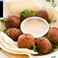 Falafel (5pcs) · Chickpea fritters mixed with garlic, parsley, cilantro, green onion and house blend spices d...