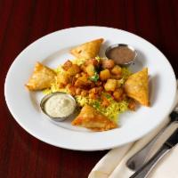 Samosa chaat platter · Veggie samosas and potatoes and chickpeas with Masala seasoning with your choice of rice,bre...