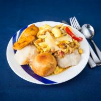 Ackee and Saltfish Full Meal · Jamaica's National Dish.

Served with White Rice or Additional Side Dishes
