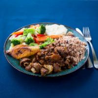 Oxtail Full Meal · Oxtail served with rice and peas and steamed vegetables.
