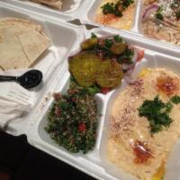 Hummus Platter · Includes a small Greek salad, hummus, mixed vegetables and a loaf and a half of pita. 
