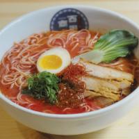Red Kakuni Ramen · Spicy pork & chicken broth based noodle soup with braised pork belly, soft boiled soy marina...