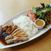 Chicken Teriyaki Platter  · Chicken teriyaki with rice and a side of salad.