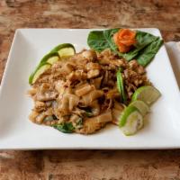 T19. Pad See Yu · Spicy stir fried broad rice noodle with Chinese broccoli and eggs. Choice of chicken or beef.