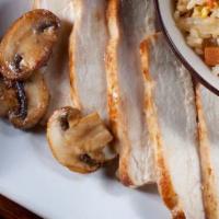 Hibachi Chicken · Chicken breast and mushrooms grilled with sesame seeds.
