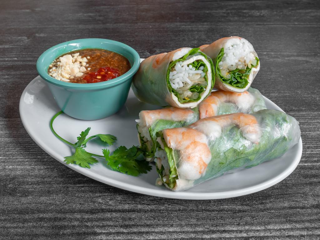 Fresh Spring Rolls · Goi cuon a. 4 pieces. Rice, vermicelli, shrimp and chicken, vegetables rolled in rice paper with peanut sauce.

