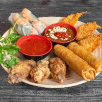 Morgan Appetizers Combo · Man khai vi thap cam g. 2 eggrolls, 2 fresh spring rolls, 3 crispy shrimp, 3 chicken wings.
