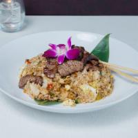 Beef Fried Rice · Stir-fry rice with beef, egg and mixed vegetables.