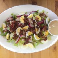 Nanny’s Salad · Lettuce, cucumber, red onion, radishes, hard-boiled eggs, crumbled bacon and honey mustard d...
