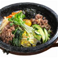 Dol-Pan Bibimbap · Rice with Assorted Vegetables with House Special Chili Sauce in the Stone Pan.
Comes with Si...