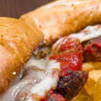 Meatball Sandwich  · Italian meatballs covered in our authentic red gravy, topped with provolone & parmesan chees...