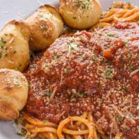 Spaghetti and Meatballs  · Spaghetti & italian meatballs, topped with our authentic red gravy.