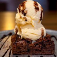 Chocolate Chip Brownie · A warm chocolate chip brownie topped with vanilla ice cream, & drizzled with your choice of ...