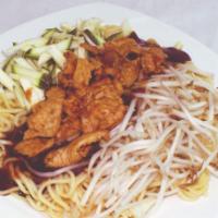SP6. Dan Dan Noodle · Szechuan dan dan sauce, shredded chicken, cucumber, bean sprouts, noodles.