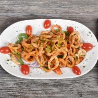 Calamari Fritti · Succulent calamari lightly breaded and gently fried with tomato sauce.