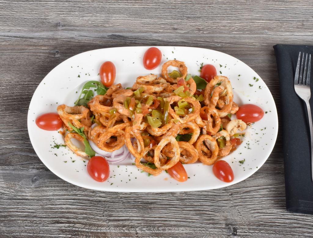 Calamari Fritti · Succulent calamari lightly breaded and gently fried with tomato sauce.