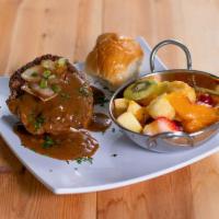 Angus Chopped Steak Combo · Served with 2 sides and bread.