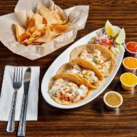 Tacos al Gobernador · Order of 3 shrimp tacos. Shrimp is cooked with onions, tomatoes, cilantro, chile chilaca pep...