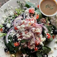 Spinach Salad · Baby spinach greens, roasted peppers, feta, olives and red onion.