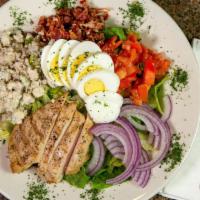 Cobb Salad · Grilled chicken, bacon, blue cheese crumbles, tomato, egg and red onion.