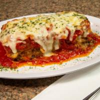 Meat Lasagna · Baked pasta layered with ricotta, mozzarella and meat sauce.