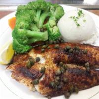 Tilapia · A delicate costa rican fish sauteed in paprika butter with capers and white wine served with...