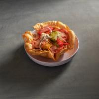 Taco Salad · Strips of our chicken, black beans, avocado, tomatoes, red onions, green or red peppers, cor...