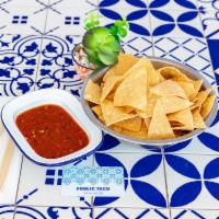 Chips and Salsa · House chips and roasted tomato salsa.