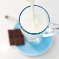 Submarino Hot Chocolate · A chunk of artisanal chocolate dunked in hot milk. Argentineans don't mess around when it co...