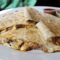 Carnitas Quesadilla · Grilled flour tortilla filled with mozzarella cheese and shredded pork. Served with chipotle...