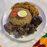 Chep Yapah · Joffof Rice with lamp and mixed vegetables onion sauce cooked with mixed vegetables serve on...